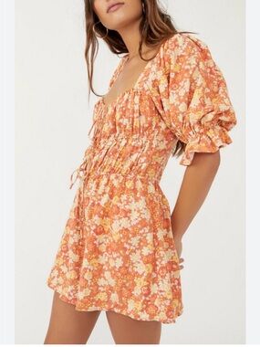 Free People Show Me Love Romper in a vibrant orange floral print  size xsmall